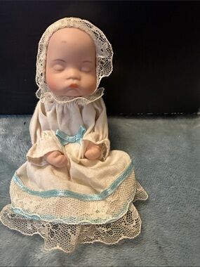 Vintage Style Cream Baby Doll with Light Blue Trim